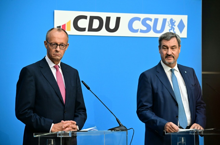 Union will bei Wahlsieg Steuern senken und kündigt harte Asylpolitik an